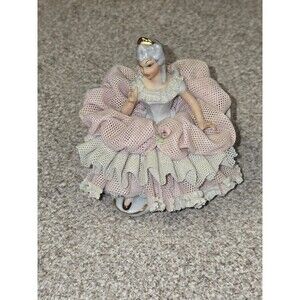 Sandizell porcelain figurine of a woman in a pink and white lace dress